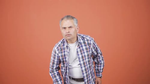 Man Squinting Eyes, Shocked Pointing Finger