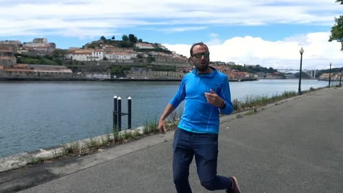 Man Checking Pulse On Smartwatch After Jogging In City, Super Slow Motion 120fps