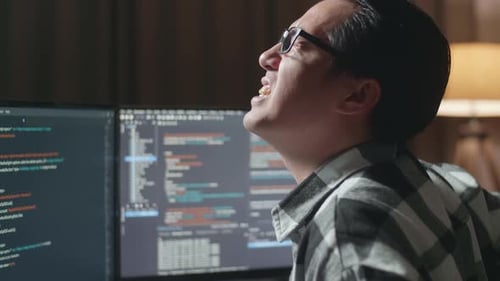 Close Up Of Asian Male Programmer Having A Backache While Creating Software Engineer Developing