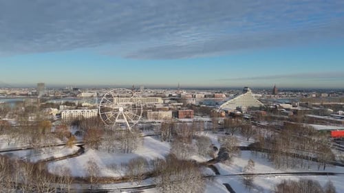 Latvia, Riga Winter Aerial View of City Skyline, Ferris Wheel, Riga Castle, Old Town Daugava River