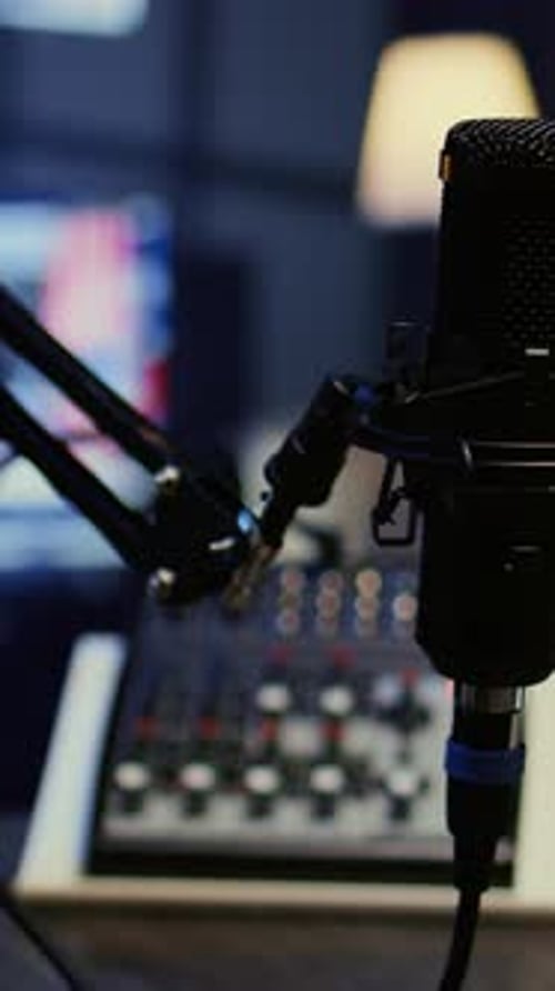 Vertical Video Panning Shot of High Tech Mic Used to Produce Quality Online Show for Livestreaming