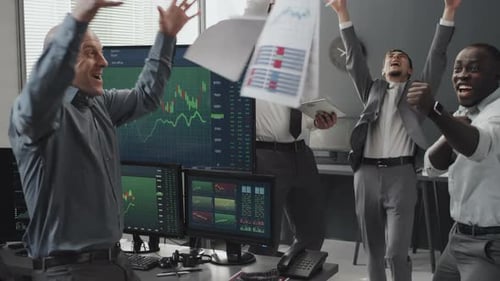Cheerful Stock Traders Enjoying Results