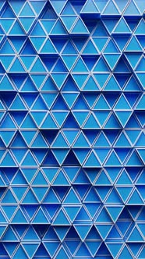 Animación 3D en bucle de triángulos azules que forman un fondo moderno y abstracto.