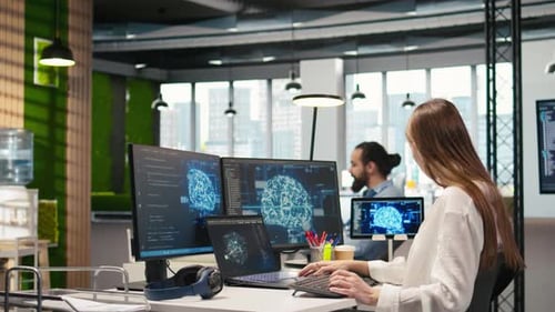 Female Programmer in Office Integrating AI Machine Learning Systems