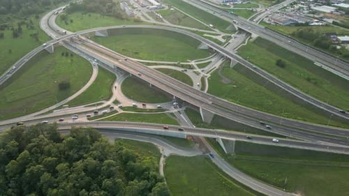Cars Moving on Transport Road Junction in City Aerial View