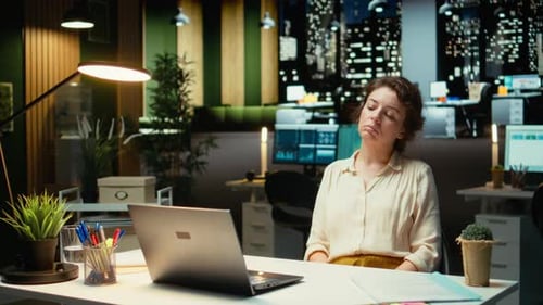 Entrepreneur Contemplating on a Complex Problem in a Dark Office Late at Night