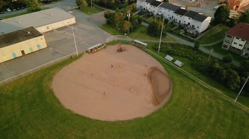Baseball Field with Players in Uniform Playing the Game of Baseball