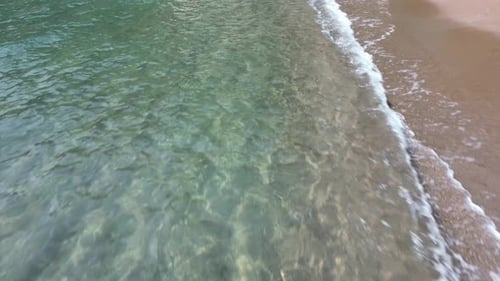 The drone flies over the sea. Beautiful clear water of the Adriatic Sea off the coast of Croatia.
