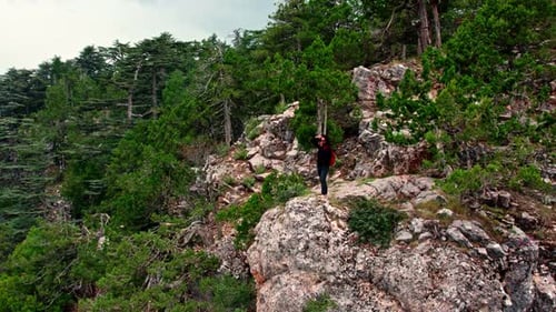 Nature Photographer on the Edge of the Cliff