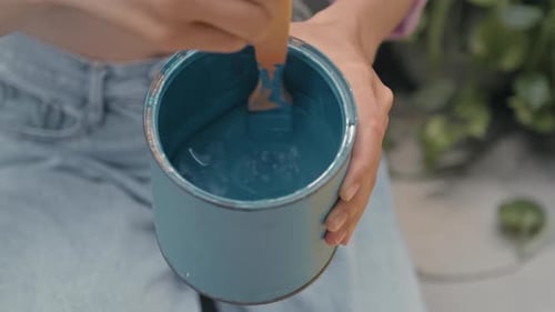 Mixing Light Blue Paint Indoors