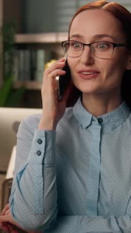 Smiling Caucasian Ginger Business Woman Talking on Mobile Phone Indoor Office Happy Female in