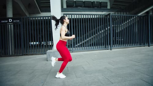 Fitness Girl Running Outdoor in . Athlete Woman Training Run Exercise