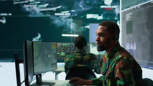 Men Working with High-Tech Military Technology in Office