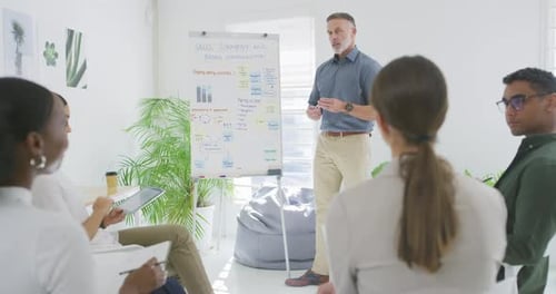4k video footage of a group of business people attending a workshop