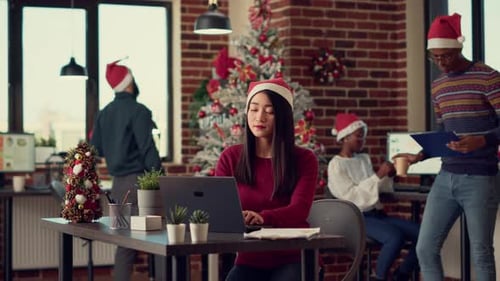 Festive Office Celebrates Christmas with Gifts and Cheer