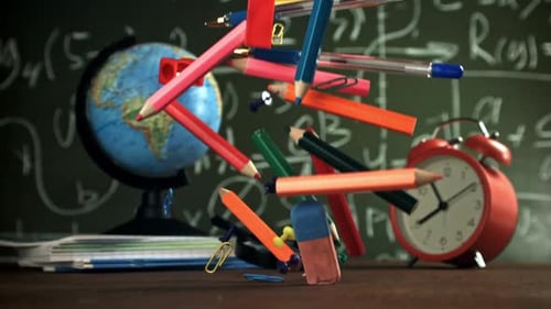 Various School Tools Fall on the Desk Filmed on a Highspeed Camera at 1000 Fps