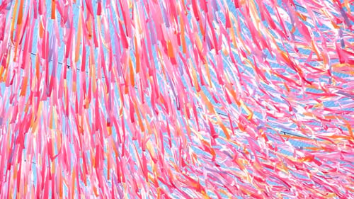 Abstract pink and orange ribbons blowing in wind