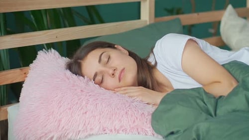 Portrait of a Young Girl Sleeping in a Cozy Bed at Home Comfortable Sleeping