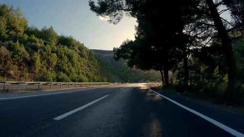 Drive on Mountain Road with Black Asphalt and Fresh White Markings
