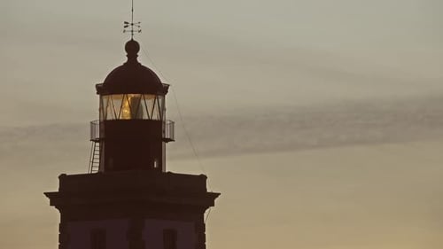 Lighthouse Lighting in the Twilight at Sunset