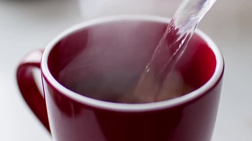 Pouring Hot Water to Make Coffee Hot Water Pouring in Cup with Instant Coffee