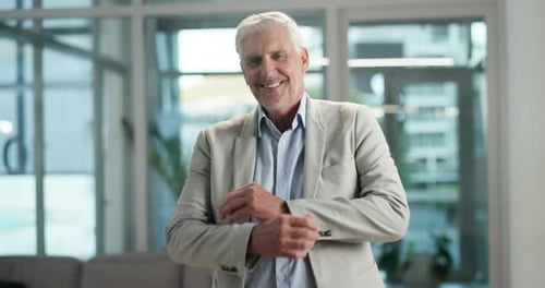 Crossed arms, lobby and face of mature businessman in office with confidence, pride and career