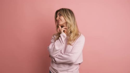 Woman Thinking and Having a Light Bulb Moment