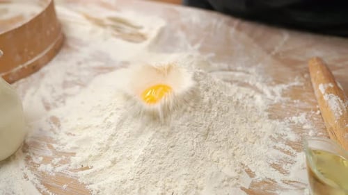 Egg Falls Into Flour