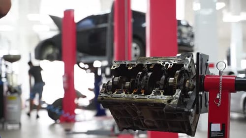 Auto Mechanic Disassembles Engine Block at Service Station Expert Removes Crankshaft Bearings in