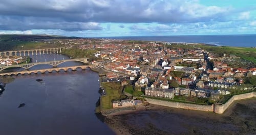 Aerial View of Charming Coastal Town and River