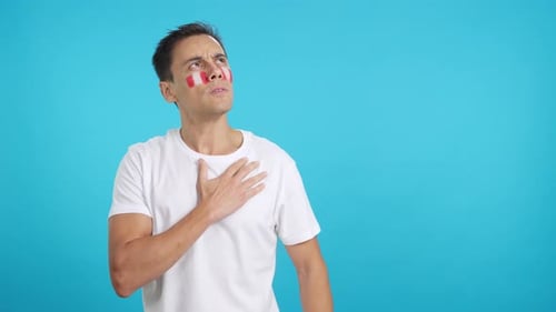 Man Listening to the Peru National Anthem with Solemnity