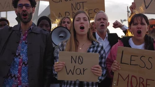 Group of People Protest for Peace in City
