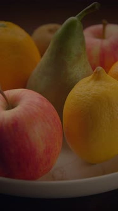 Colorful Fruit Still Life on White Plate