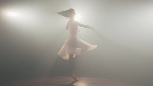 Ballerina Dancing on the Stage