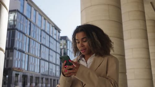 Biracial Woman Sees Results of Audition Looking Happy