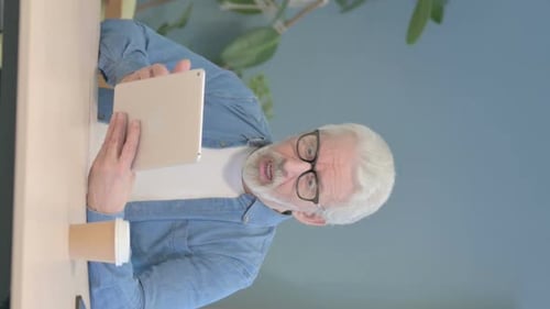 Senior Man Having a Video Call on Tablet
