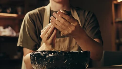 Woman Potter Works with Clay on Master Class in Studio Working Process in Ceramic Workshop Potter