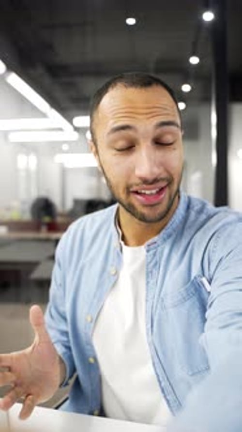 Young Adult Communicating in Modern Office
