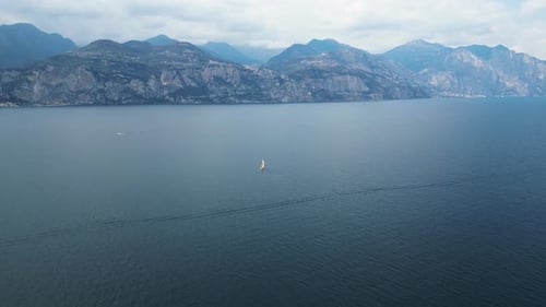 From This Aerial View Lake Garda's Tranquil Waters Seem to Go on Forever The Mountainous Terrain in