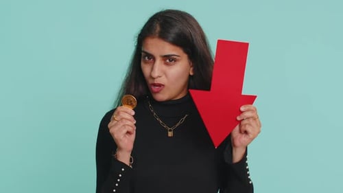 Upset Woman Showing Red Arrow Pointing Down Fall of Cryptocurrency Stock Market Mining Bitcoins BTC