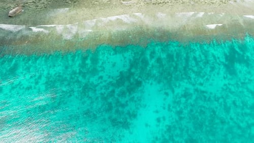 Aerial View of Turquoise Waters with Sandy Shoreline Seychelles Mahe