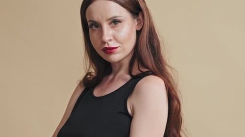 Model Posing for Camera at Studio