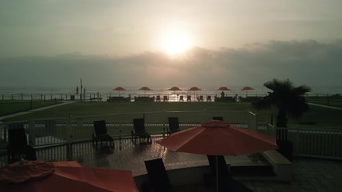 Soothing Calm Sunset Swimming Pool at Golden Hour Drone Wide Shot