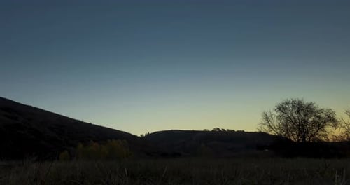 Mountain Meadow Timelapse at the Summer or Autumn Sunrise Time Wild Nature and Rural Field Clear Sky