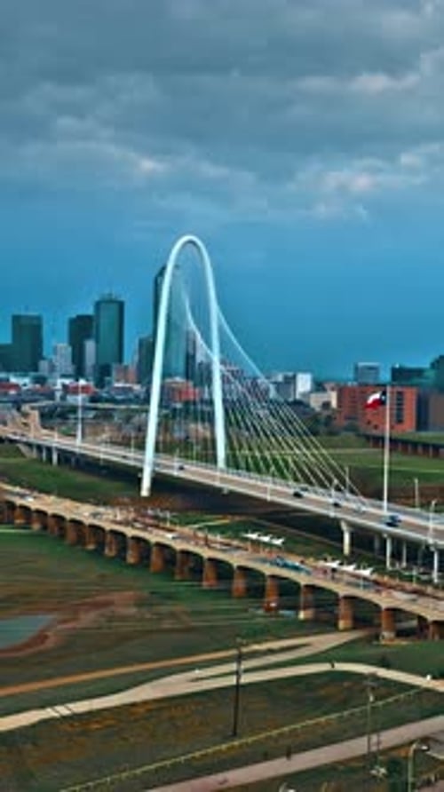 Aerial view of Dallas showcasing iconic bridge and skyline