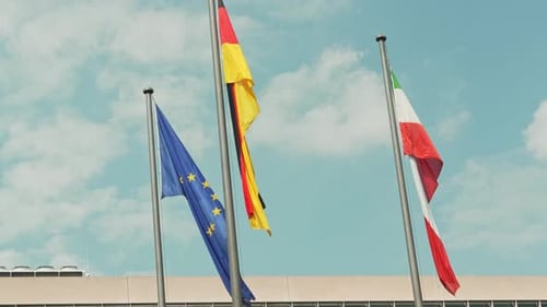 Flags of Europe, Germany, and Italy Waving