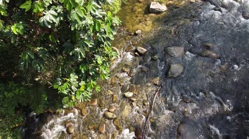 Bird eye view water flow over rock