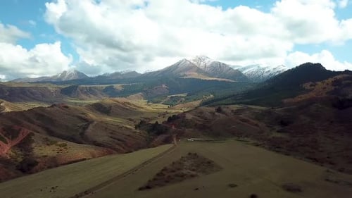 Valley with snow capped mountains