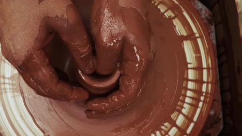 Shaping A Clay Pot In A Ceramics Workshop 28