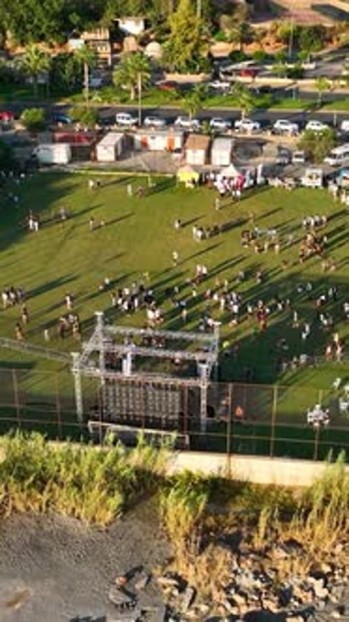 Crowd Gathering on a Field from Above